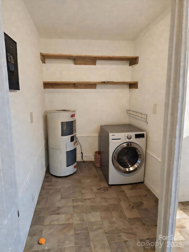 206 Fox Den Rd, Troy, NC 27371 - laundry area with washer / dryer and electric water heater