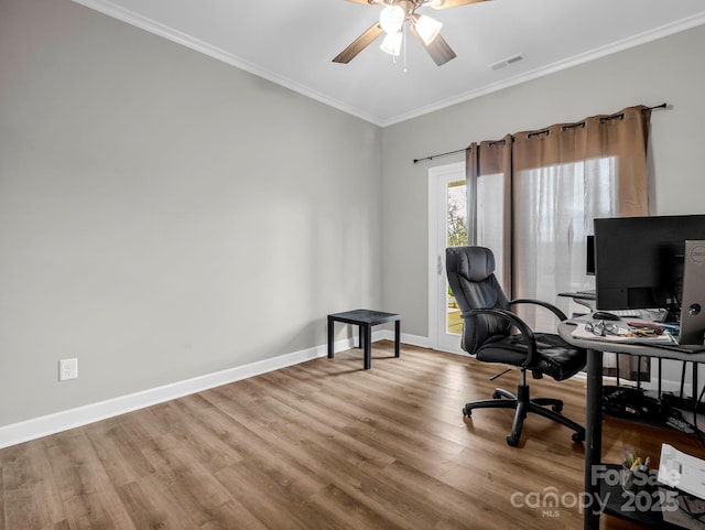 office with hardwood / wood-style floors, crown molding, and ceiling fan