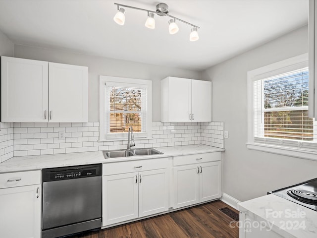 kitchen with sink, white cabinets, stainless steel dishwasher, and plenty of natural light