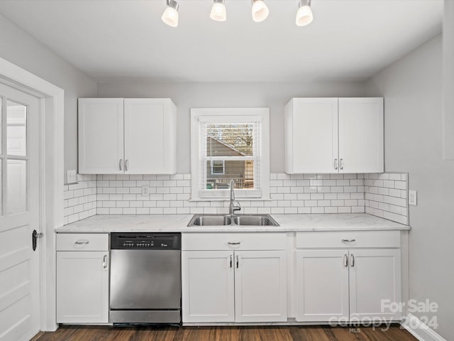 kitchen featuring dishwasher, dark wood-type flooring, white cabinets, sink, and light stone counters