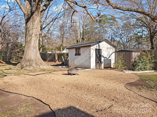 exterior space with a shed