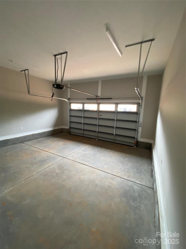 garage featuring baseboards