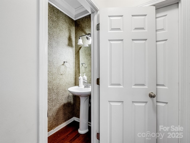 9903 Southampton Commons Dr, Charlotte, NC 28277 - bathroom featuring wallpapered walls, wood finished floors, and ornamental molding