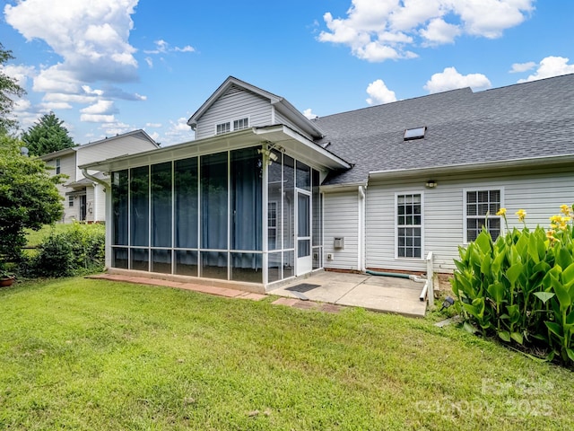 9903 Southampton Commons Dr, Charlotte, NC 28277 - back of property with a patio, a sunroom, roof with shingles, and a yard