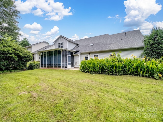 9903 Southampton Commons Dr, Charlotte, NC 28277 - rear view of house with a sunroom, a yard, and roof with shingles