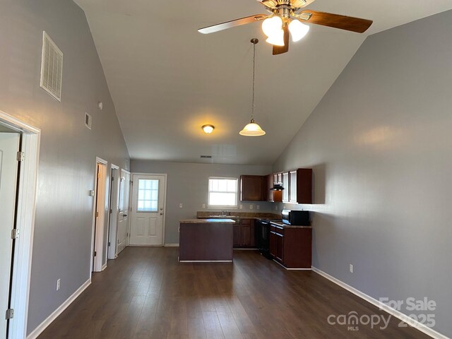 kitchen featuring dark hardwood / wood-style flooring, a center island, high vaulted ceiling, and ceiling fan