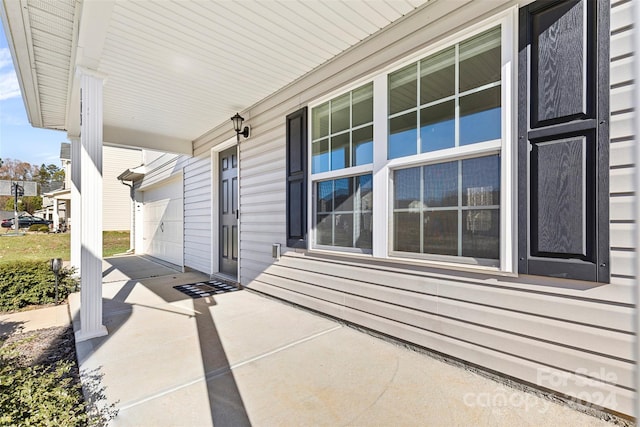 view of patio / terrace with a garage