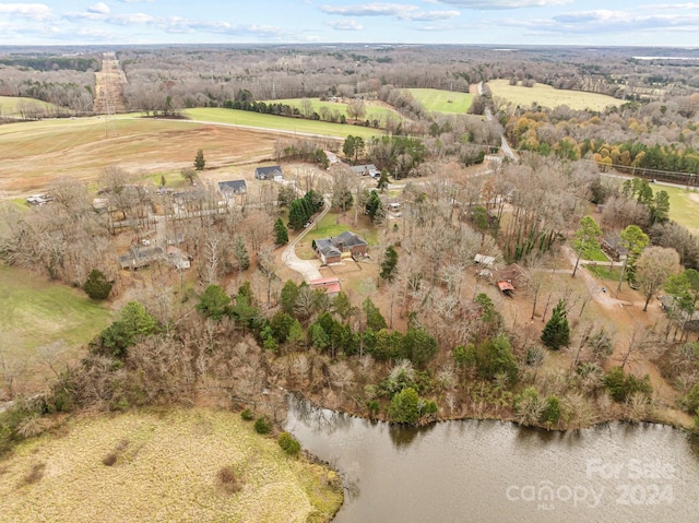 bird's eye view with a rural view and a water view