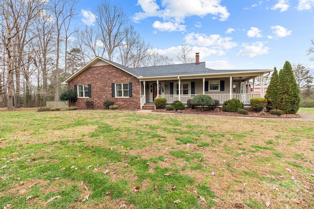 single story home featuring a front yard and a porch