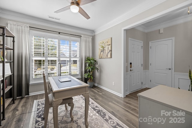 office area featuring ceiling fan, dark hardwood / wood-style flooring, and crown molding