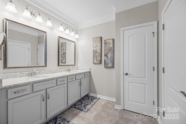 bathroom featuring crown molding and vanity