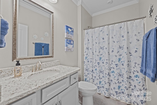 bathroom featuring toilet, vanity, tile patterned floors, crown molding, and a shower with shower curtain