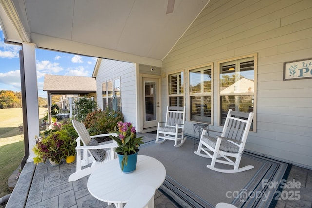 sunroom with vaulted ceiling