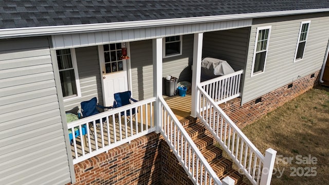 wooden terrace featuring a porch