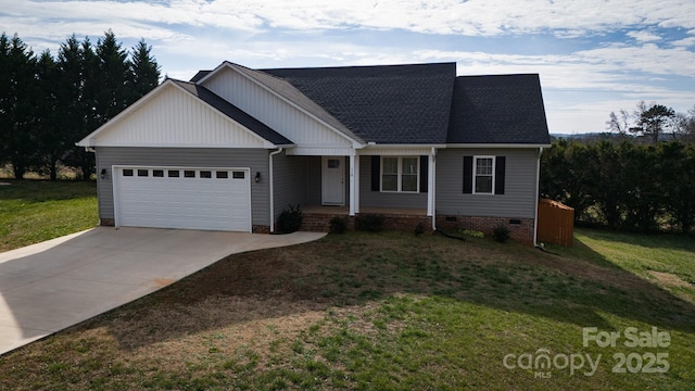 view of front of house featuring a garage and a front yard