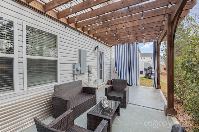 view of patio featuring a pergola and outdoor lounge area