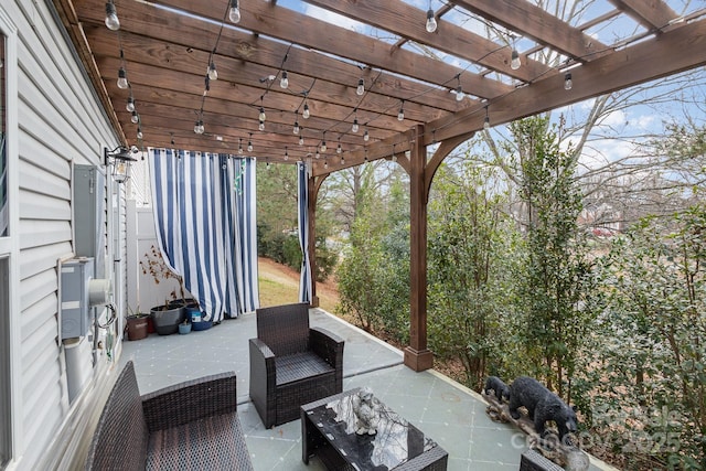 view of patio featuring a pergola