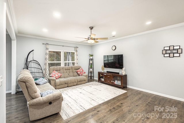 living room featuring dark hardwood / wood-style floors, ceiling fan, and ornamental molding