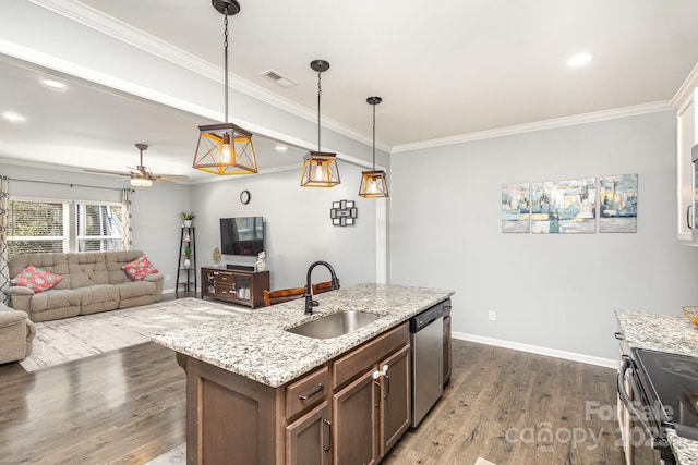 kitchen featuring pendant lighting, dishwasher, sink, ceiling fan, and range