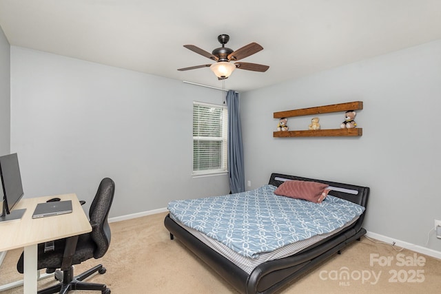 bedroom featuring ceiling fan and light colored carpet