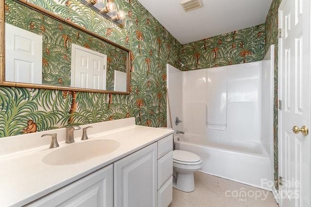 full bathroom featuring vanity, toilet, and bathtub / shower combination