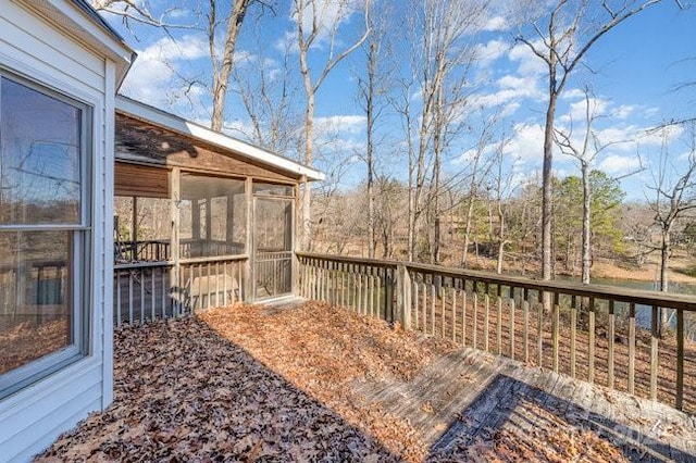 deck with a sunroom