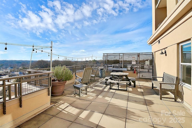 view of patio with a balcony