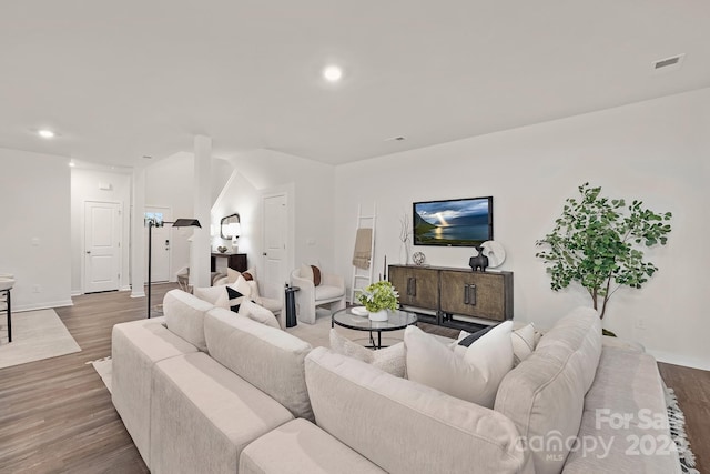 living room with hardwood / wood-style flooring