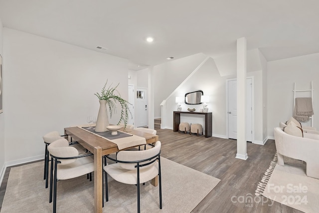 dining area featuring hardwood / wood-style flooring