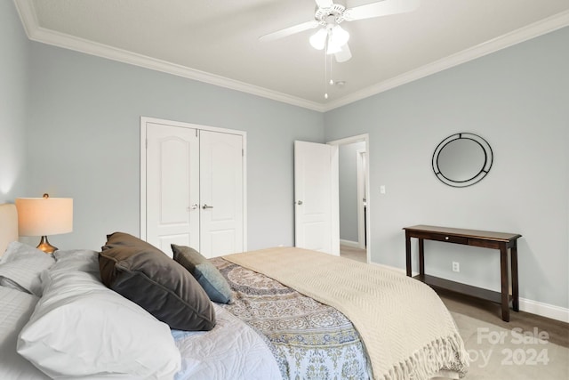 bedroom with a closet, ceiling fan, and crown molding