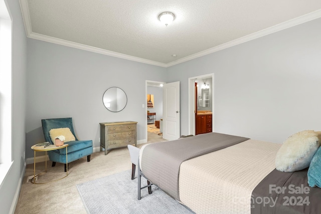 bedroom with a textured ceiling, connected bathroom, carpet floors, and crown molding