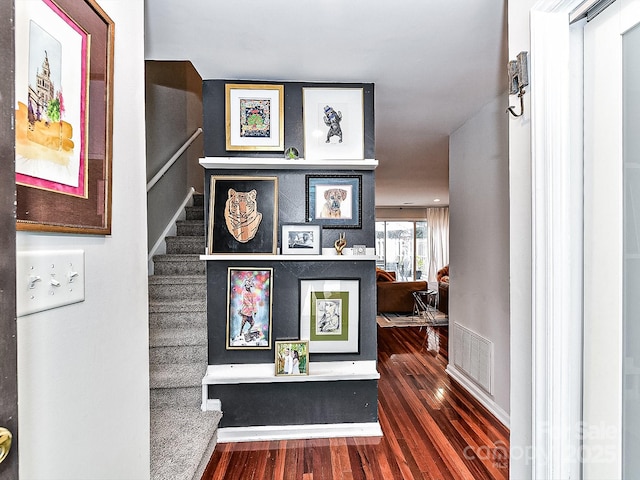 hallway featuring dark hardwood / wood-style flooring