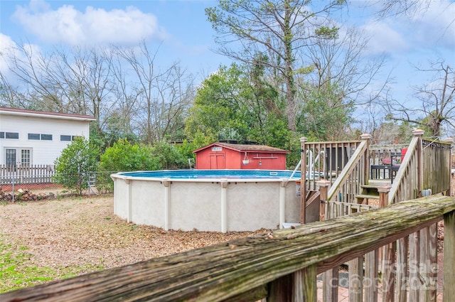 wooden deck featuring a storage shed