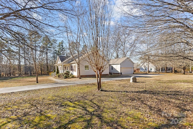 view of yard with a garage