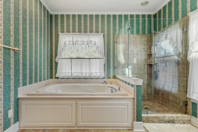 bathroom featuring separate shower and tub and crown molding