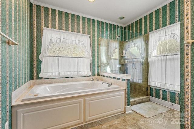 bathroom featuring separate shower and tub and crown molding