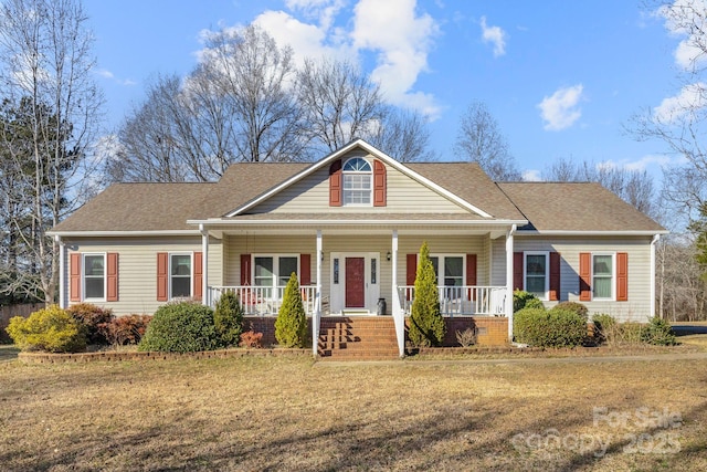 view of front of home featuring covered porch and a front yard