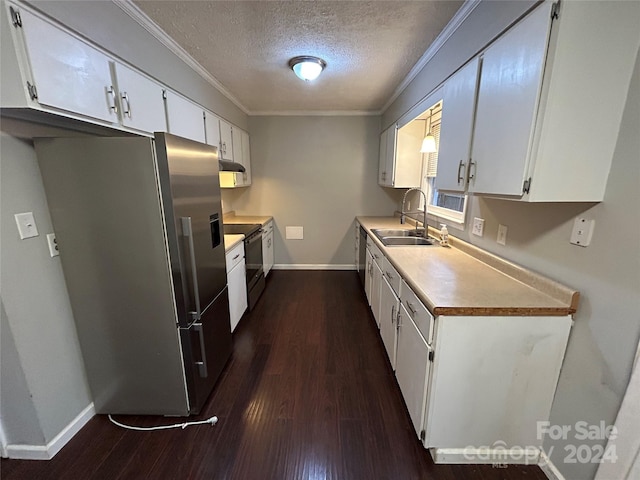 kitchen with dark wood-type flooring, sink, a textured ceiling, appliances with stainless steel finishes, and white cabinetry