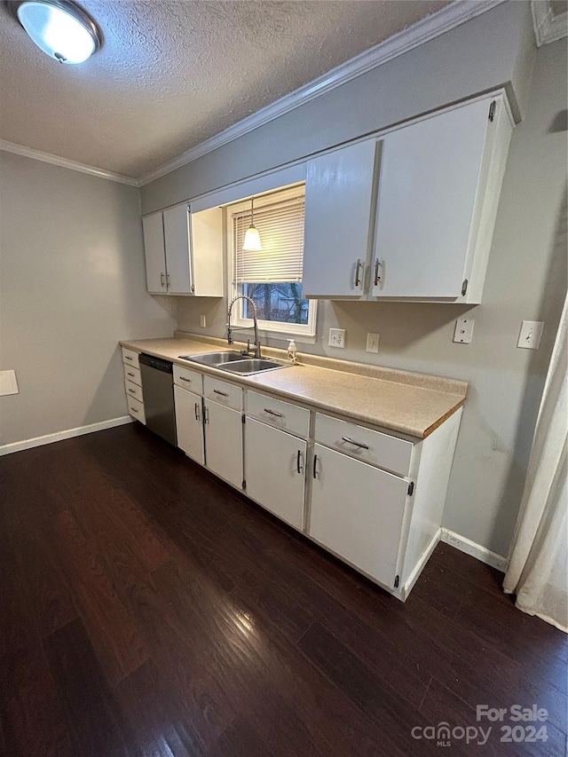 kitchen featuring dishwasher, sink, dark hardwood / wood-style floors, a textured ceiling, and white cabinets