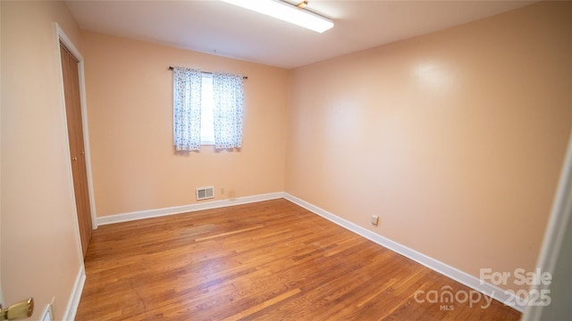 empty room featuring light hardwood / wood-style floors