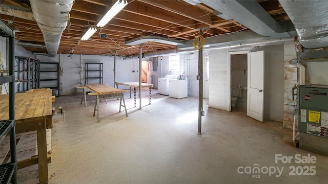 basement featuring separate washer and dryer