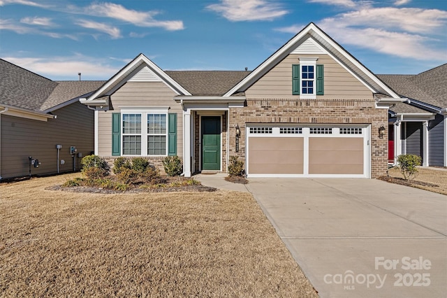 view of front of house with a front lawn and a garage