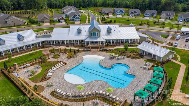 view of swimming pool featuring a patio area