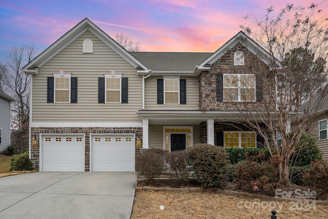 front of property featuring a garage