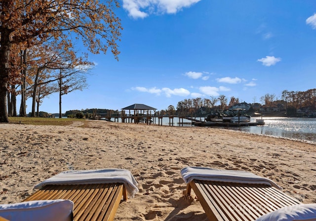 view of yard with a gazebo and a water view