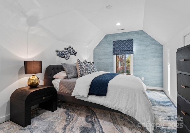 bedroom featuring lofted ceiling