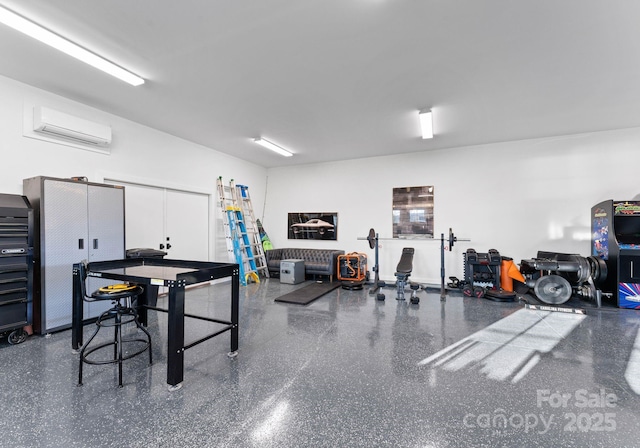 interior space with a wall mounted air conditioner