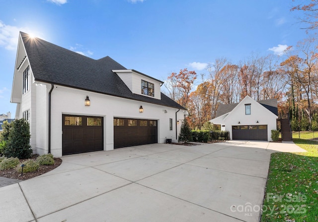 view of home's exterior with a garage