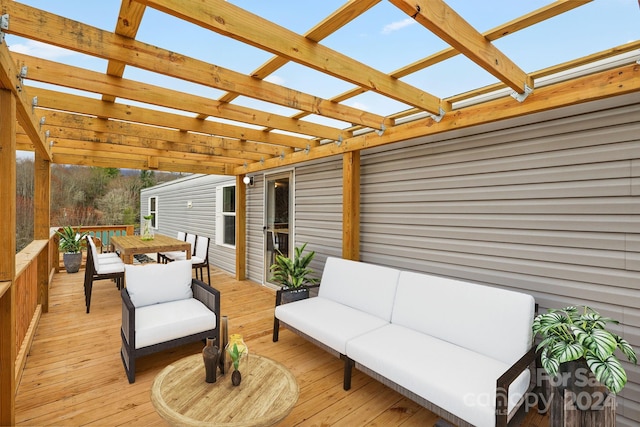 wooden terrace featuring a pergola and outdoor lounge area