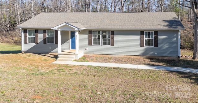 single story home featuring a front lawn